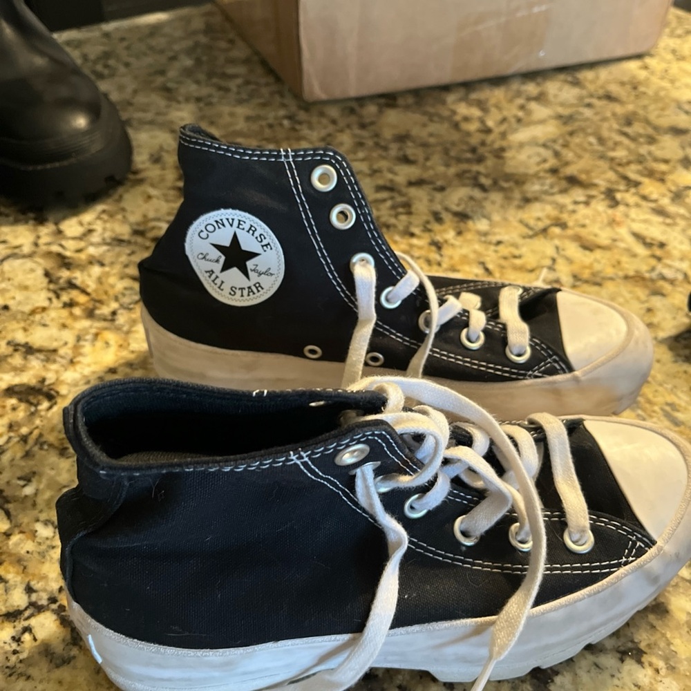 Converse women’s Black and White High-Top Sneakers